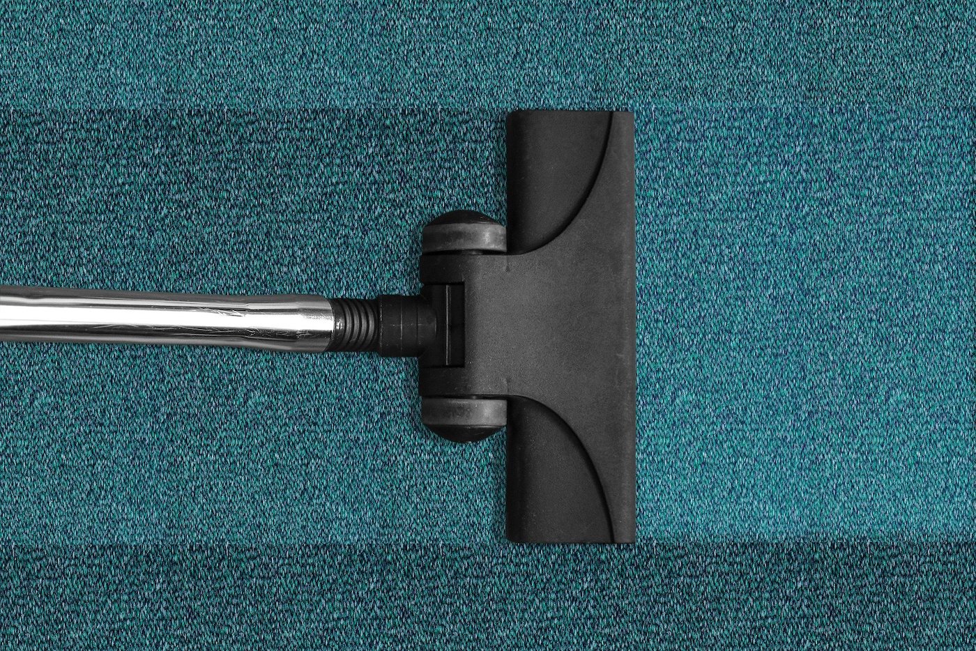 Commercial carpet-cleaning equipment in use
